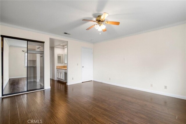 19554 Crystal Ridge Ln, Porter Ranch, CA 91326 - unfurnished living room featuring ceiling fan, dark wood finished floors, crown molding, and baseboards