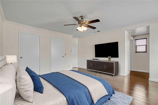 19554 Crystal Ridge Ln, Porter Ranch, CA 91326 - bedroom featuring wood finished floors, baseboards, crown molding, and a ceiling fan