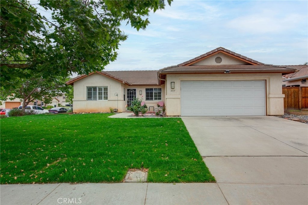 557 Alta Meadow Ln, Escondido, CA 92027 - ranch-style home featuring stucco siding, a tiled roof, driveway, and an attached garage