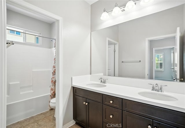 35414 Laurel Tree Ct, Winchester, CA 92596 - full bath with double vanity, plenty of natural light, shower / bath combination with curtain, and tile patterned flooring