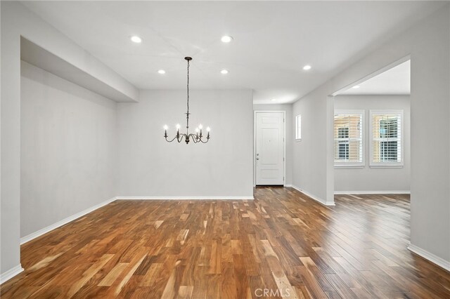 35414 Laurel Tree Ct, Winchester, CA 92596 - unfurnished dining area featuring wood finished floors, a chandelier, and recessed lighting