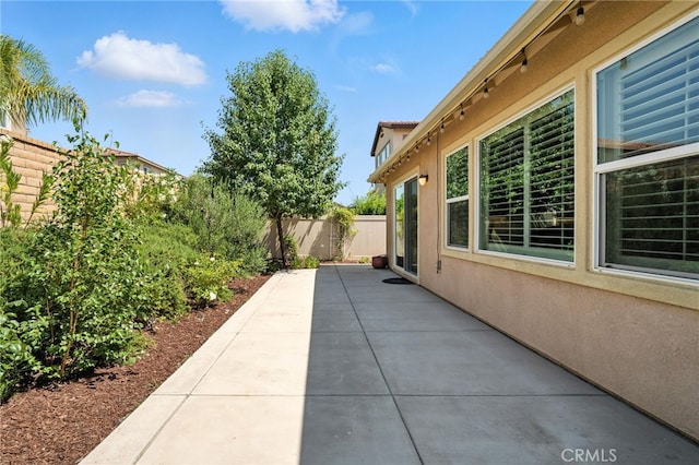 35414 Laurel Tree Ct, Winchester, CA 92596 - fenced backyard featuring a patio area