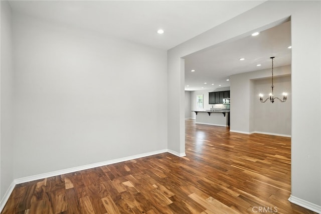 35414 Laurel Tree Ct, Winchester, CA 92596 - unfurnished room featuring dark wood finished floors, a chandelier, and recessed lighting