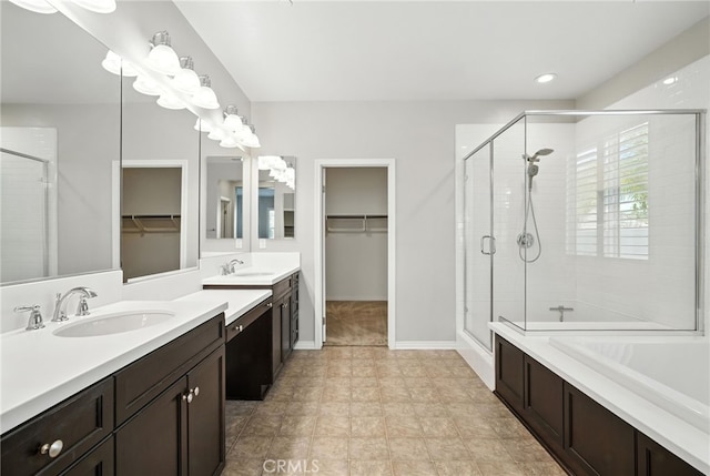 35414 Laurel Tree Ct, Winchester, CA 92596 - full bathroom featuring a shower stall, a walk in closet, two vanities, and a bath