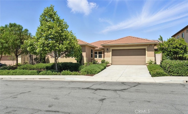 35414 Laurel Tree Ct, Winchester, CA 92596 - mediterranean / spanish home with stucco siding, driveway, a garage, and a tile roof