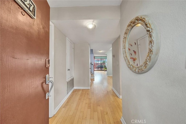 230 Bethany Rd Unit 127, Burbank, CA 91504 - corridor with light wood-style floors and baseboards