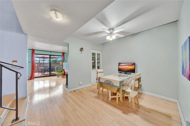 230 Bethany Rd Unit 127, Burbank, CA 91504 - dining space featuring wood-type flooring, baseboards, and a ceiling fan