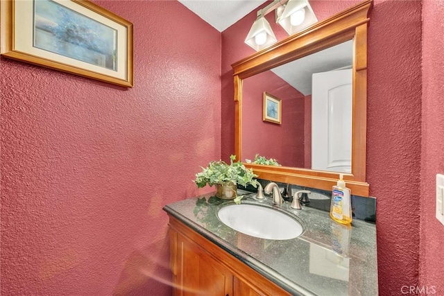 230 Bethany Rd Unit 127, Burbank, CA 91504 - bathroom with a textured wall and vanity