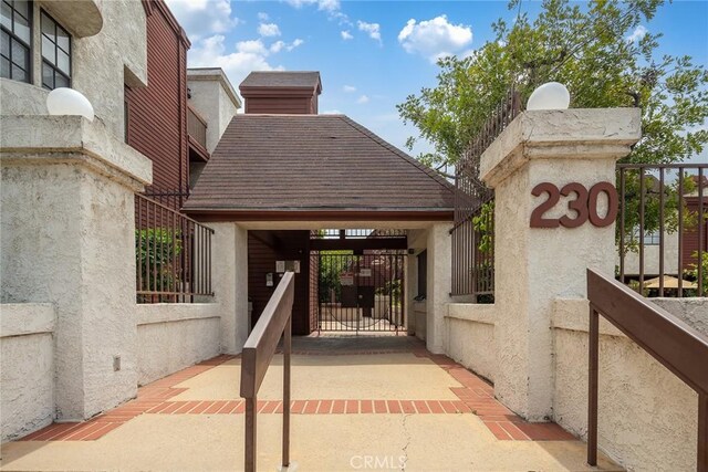 230 Bethany Rd Unit 127, Burbank, CA 91504 - view of parking featuring a gate