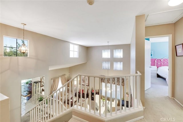 2825 W Newgrove St, Lancaster, CA 93536 - stairs featuring carpet floors, baseboards, and a high ceiling