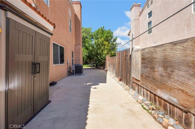 2825 W Newgrove St, Lancaster, CA 93536 - view of patio / terrace with central air condition unit