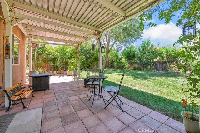2825 W Newgrove St, Lancaster, CA 93536 - view of patio / terrace with a pergola