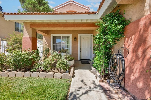 2825 W Newgrove St, Lancaster, CA 93536 - entrance to property featuring stucco siding