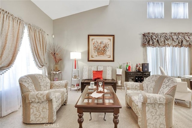 2825 W Newgrove St, Lancaster, CA 93536 - living room with carpet flooring, healthy amount of natural light, and high vaulted ceiling