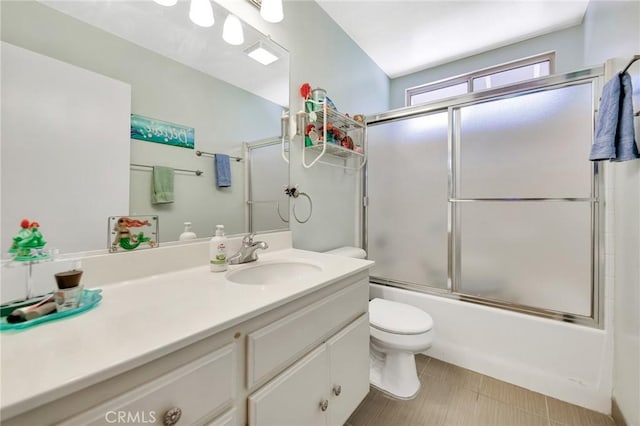 2825 W Newgrove St, Lancaster, CA 93536 - bathroom with vanity, toilet, and bath / shower combo with glass door