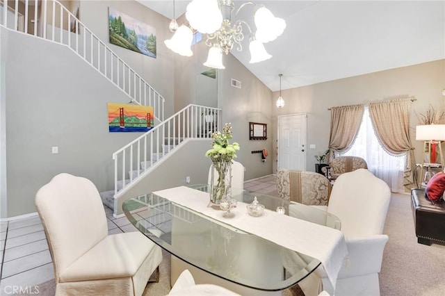 2825 W Newgrove St, Lancaster, CA 93536 - dining room featuring stairway, high vaulted ceiling, a chandelier, and tile patterned flooring