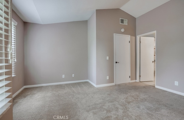 253 Gallery Way, Tustin, CA 92782 - spare room featuring vaulted ceiling, carpet, and baseboards