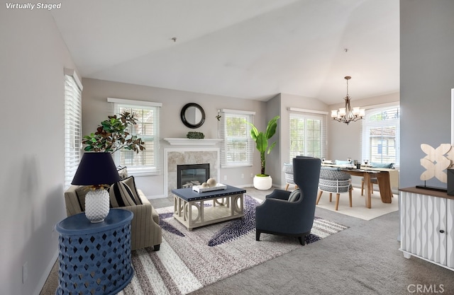 253 Gallery Way, Tustin, CA 92782 - living room with vaulted ceiling, a chandelier, carpet flooring, a fireplace, and baseboards
