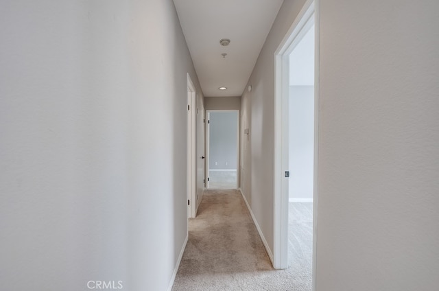253 Gallery Way, Tustin, CA 92782 - hall featuring light carpet, baseboards, and recessed lighting