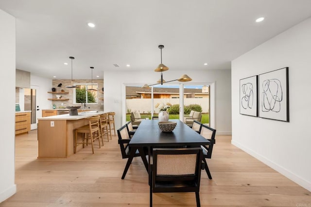 4252 Don Jose Dr, Los Angeles, CA 90008 - dining area featuring recessed lighting, light wood-style floors, and baseboards