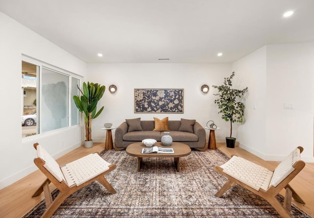 4252 Don Jose Dr, Los Angeles, CA 90008 - living area with recessed lighting, wood finished floors, and baseboards