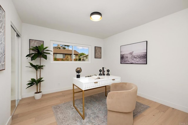 4252 Don Jose Dr, Los Angeles, CA 90008 - office area with light wood-style flooring and baseboards