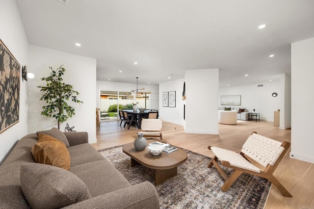 4252 Don Jose Dr, Los Angeles, CA 90008 - living area featuring light wood finished floors and recessed lighting