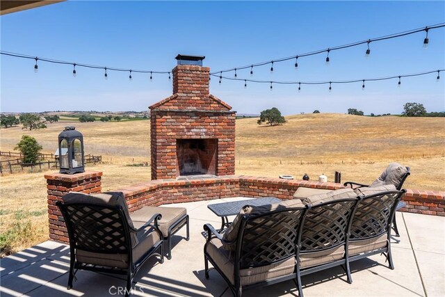 26 Deer View Ln, Templeton, CA 93465 - view of patio featuring a view of rural / pastoral area and an outdoor living space with a fireplace