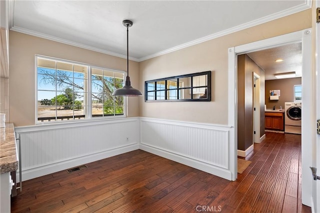 26 Deer View Ln, Templeton, CA 93465 - unfurnished dining area with washer / dryer, dark wood-type flooring, wainscoting, ornamental molding, and a sink
