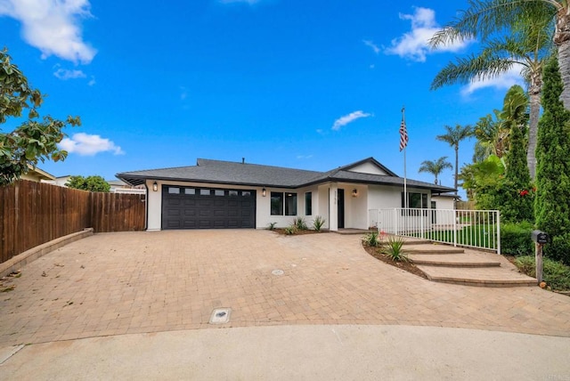 3750 Grecourt Way, Carlsbad, CA 92008 - single story home with an attached garage, stucco siding, and driveway