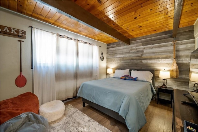 865 Bear Mtn, Big Bear City, CA 92314 - bedroom with wooden walls, wood ceiling with exposed beams, and wood finished floors