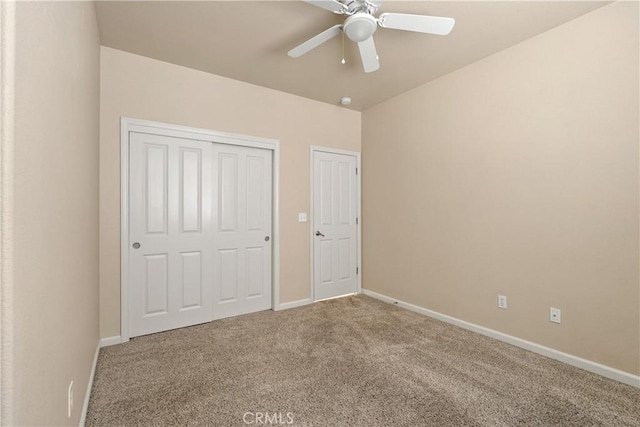 1033 Raven Ln, Chico, CA 95926 - unfurnished bedroom featuring carpet, baseboards, a ceiling fan, and a closet