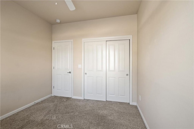 1033 Raven Ln, Chico, CA 95926 - unfurnished bedroom featuring carpet, baseboards, a closet, and ceiling fan