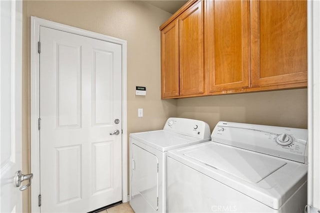 1033 Raven Ln, Chico, CA 95926 - laundry room with cabinet space and washing machine and clothes dryer