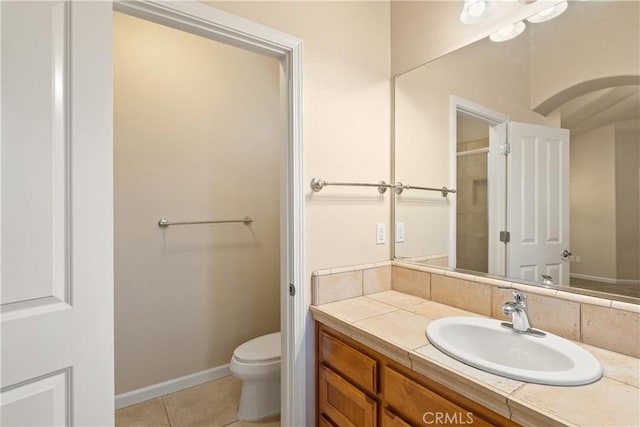 1033 Raven Ln, Chico, CA 95926 - bathroom featuring toilet, vanity, and tile patterned floors