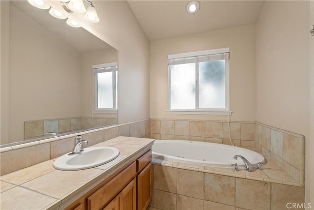 1033 Raven Ln, Chico, CA 95926 - bathroom with vanity and a jetted tub