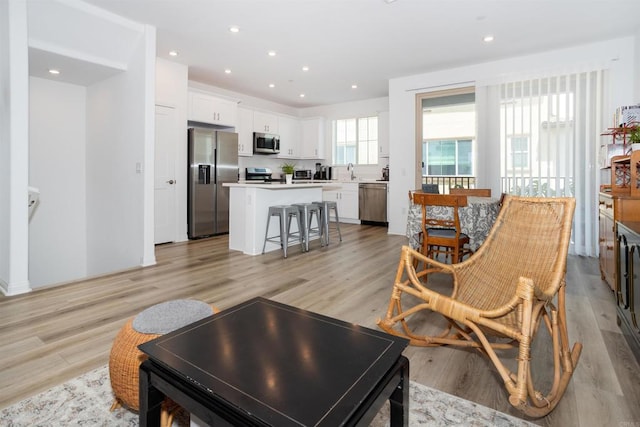 1807 Mesquite Way, Oceanside, CA 92056 - living area featuring light wood-style floors and recessed lighting