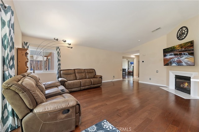 1361 Lindsey, San Jacinto, CA 92583 - living room with wood finished floors, lofted ceiling, baseboards, and a glass covered fireplace