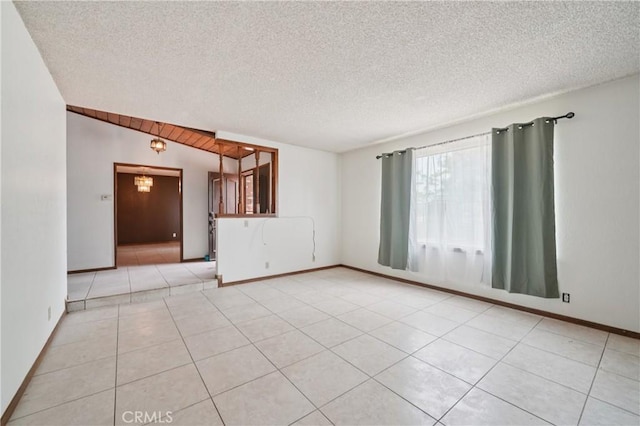 14676 Poplar St, Hesperia, CA 92345 - unfurnished room featuring light tile patterned floors, a textured ceiling, and baseboards