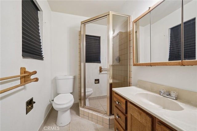14676 Poplar St, Hesperia, CA 92345 - bathroom with toilet, vanity, a stall shower, tile patterned flooring, and baseboards