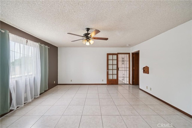 14676 Poplar St, Hesperia, CA 92345 - empty room featuring ceiling fan, baseboards, and a textured ceiling