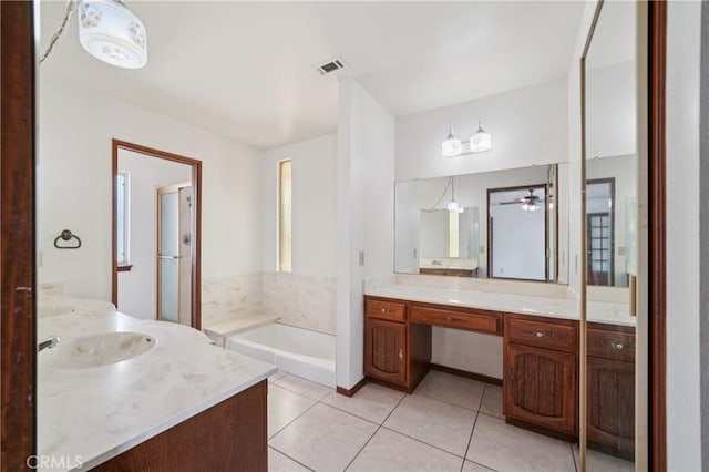 14676 Poplar St, Hesperia, CA 92345 - full bathroom featuring vanity, a bath, tile patterned floors, a ceiling fan, and a stall shower