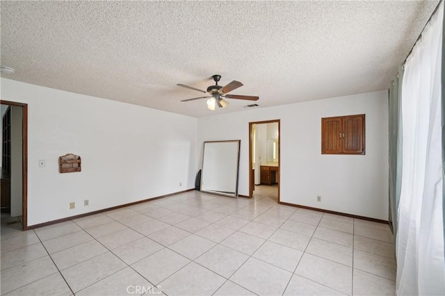 14676 Poplar St, Hesperia, CA 92345 - unfurnished room featuring ceiling fan, a textured ceiling, and baseboards