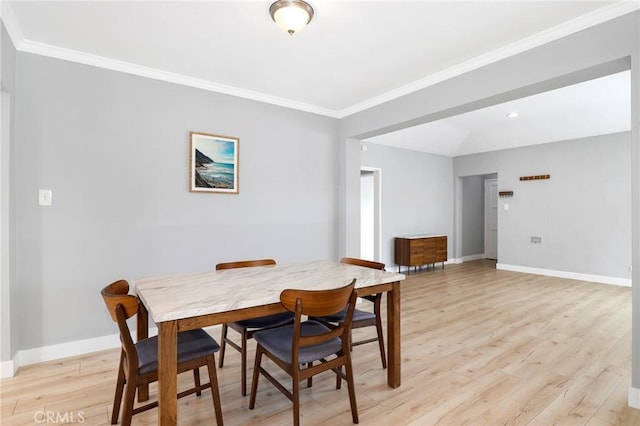 2804 W 84th St, Inglewood, CA 90305 - dining area with light wood-type flooring, crown molding, and baseboards