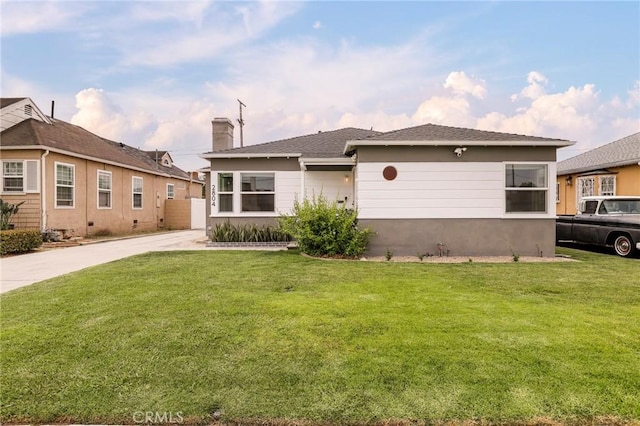 2804 W 84th St, Inglewood, CA 90305 - view of front of home featuring a chimney and concrete driveway
