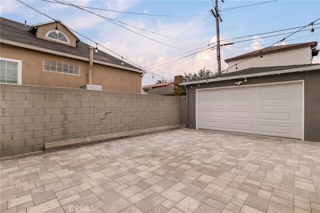 2804 W 84th St, Inglewood, CA 90305 - garage with decorative driveway
