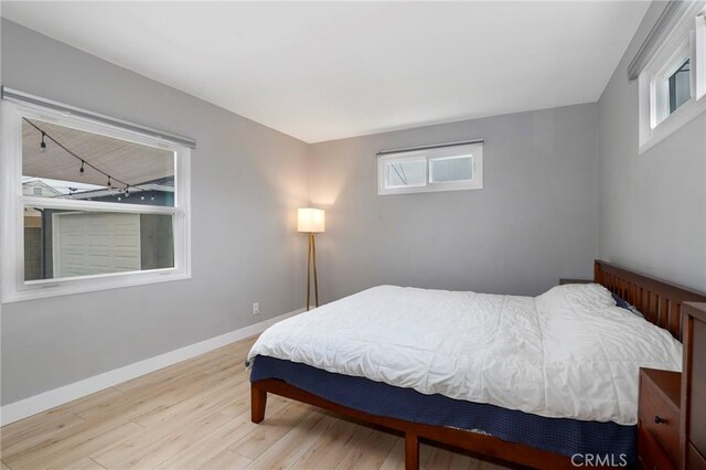 2804 W 84th St, Inglewood, CA 90305 - bedroom with wood finished floors and baseboards