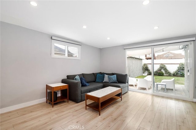 2804 W 84th St, Inglewood, CA 90305 - living room featuring light wood finished floors, recessed lighting, and baseboards