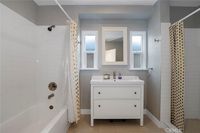 2804 W 84th St, Inglewood, CA 90305 - bathroom with shower / tub combo, vanity, plenty of natural light, and baseboards