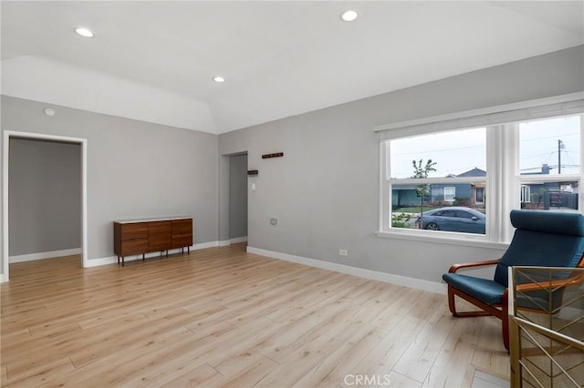 2804 W 84th St, Inglewood, CA 90305 - sitting room featuring light wood-style floors, lofted ceiling, baseboards, and recessed lighting